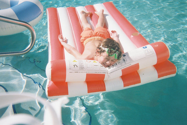 Red and White Striped Raft