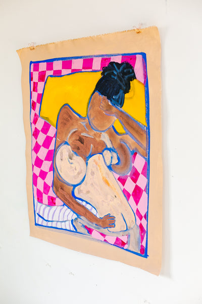 Woman nursing baby in bed