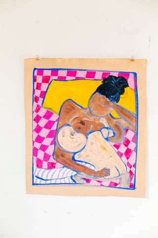 Woman nursing baby in bed