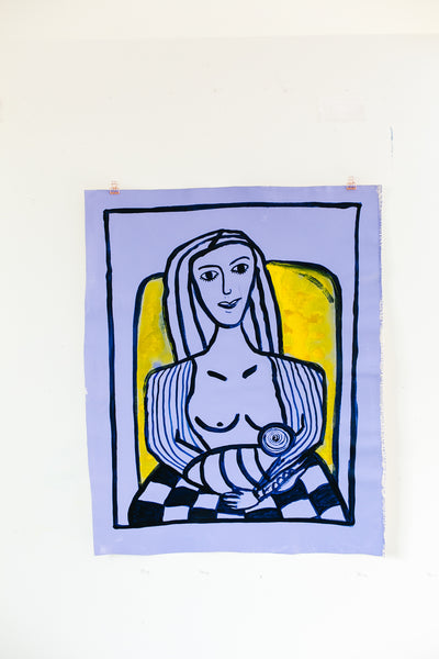 Woman in Chair with checkered blanket
