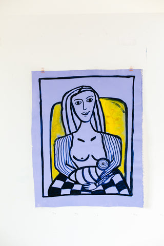 Woman in Chair with checkered blanket